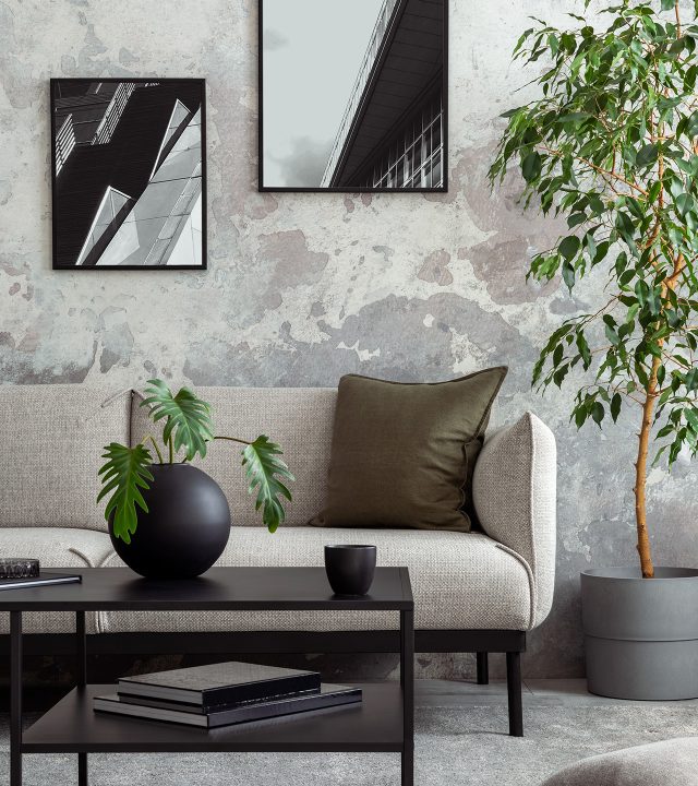 1.interior-design-concrete-living-room-with-mock-up-poster-frame-gray-sofa-green-pillow-coffee